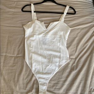 Free People white bodysuit with tags